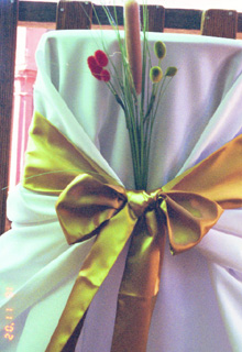 gold sash with tall flowers